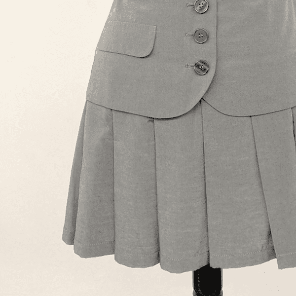 a grey skirt with buttons